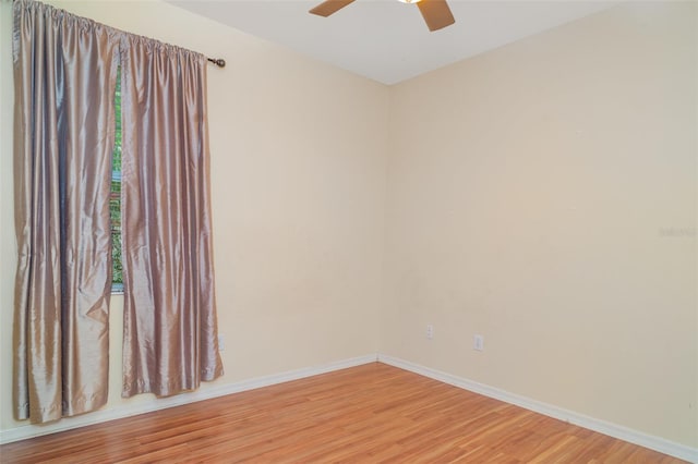 12721 Avelar Creek Dr, Riverview, FL 33578 - empty room with light wood-style floors and ceiling fan