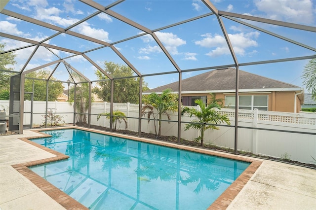 12721 Avelar Creek Dr, Riverview, FL 33578 - view of swimming pool featuring a fenced backyard, a patio, and glass enclosure