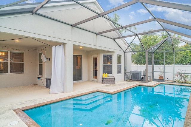 12721 Avelar Creek Dr, Riverview, FL 33578 - view of swimming pool with a patio and glass enclosure
