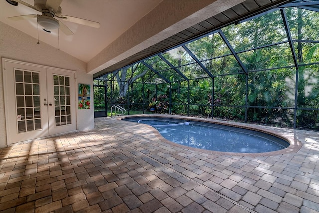 910 Kingscote Ct, Safety Harbor, FL 34695 - view of swimming pool with french doors, a patio, glass enclosure, ceiling fan, and a pool with connected hot tub
