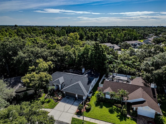 910 Kingscote Ct, Safety Harbor, FL 34695 - view from above of property featuring a heavily wooded area