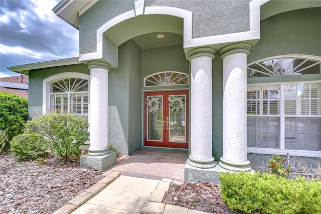 19307 Wind Dancer St, Lutz, FL 33558 - entrance to property featuring french doors and stucco siding
