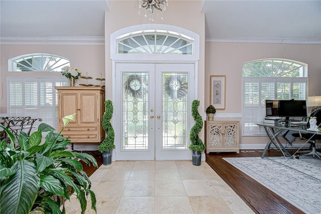 19307 Wind Dancer St, Lutz, FL 33558 - entryway with french doors, a chandelier, and ornamental molding