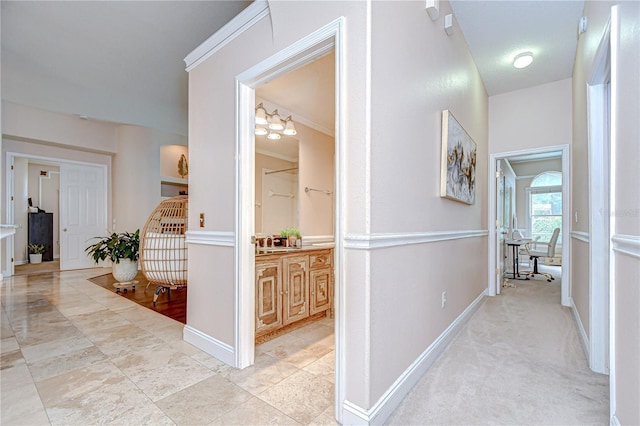 19307 Wind Dancer St, Lutz, FL 33558 - hall with baseboards and a chandelier