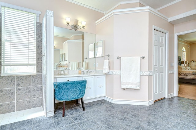19307 Wind Dancer St, Lutz, FL 33558 - ensuite bathroom with crown molding, vanity, and tiled shower