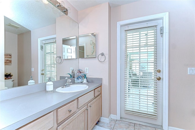 19307 Wind Dancer St, Lutz, FL 33558 - bathroom featuring vanity and tile patterned flooring