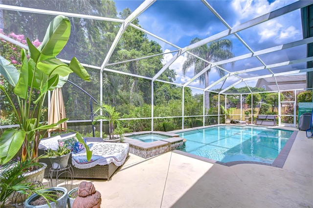 19307 Wind Dancer St, Lutz, FL 33558 - view of pool with a pool with connected hot tub, a patio area, and a lanai