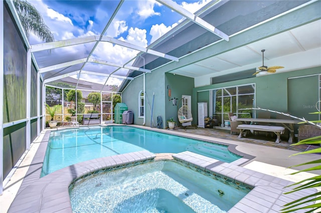 19307 Wind Dancer St, Lutz, FL 33558 - view of pool with a pool with connected hot tub, a patio, a ceiling fan, and glass enclosure