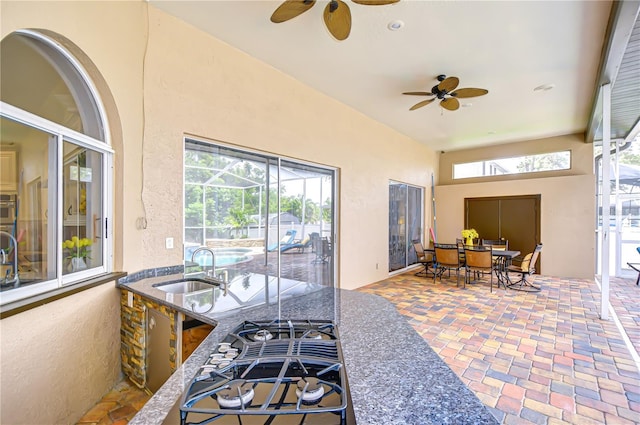 2504 Oak Landing Dr, Brandon, FL 33511 - sunroom / solarium with a ceiling fan, plenty of natural light, and outdoor dining area