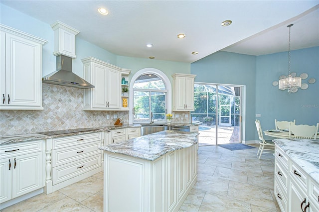 2504 Oak Landing Dr, Brandon, FL 33511 - kitchen featuring tasteful backsplash, light stone countertops, white cabinetry, and recessed lighting