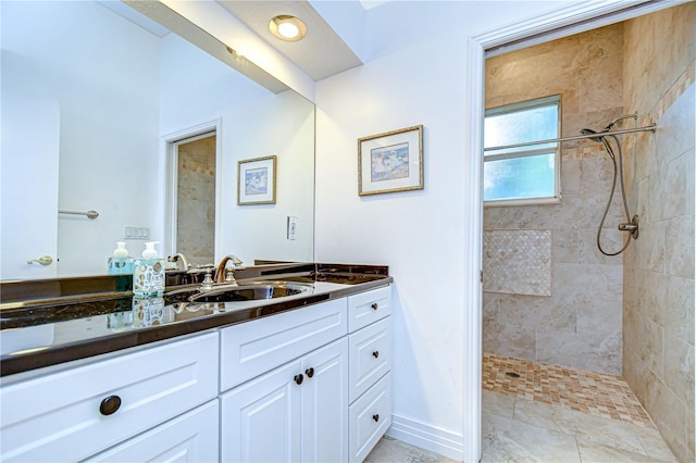 2504 Oak Landing Dr, Brandon, FL 33511 - bathroom featuring tiled shower and vanity