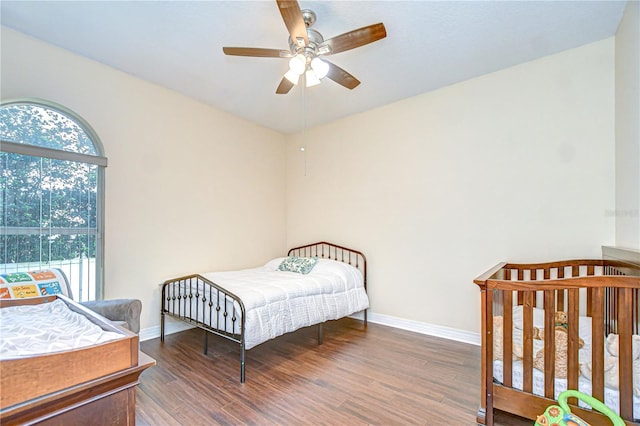 2504 Oak Landing Dr, Brandon, FL 33511 - bedroom with wood finished floors and a ceiling fan
