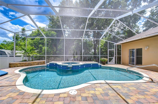 2504 Oak Landing Dr, Brandon, FL 33511 - view of pool featuring a patio, a pool with connected hot tub, and glass enclosure