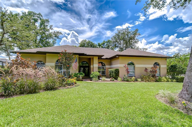 2504 Oak Landing Dr, Brandon, FL 33511 - ranch-style house with a front lawn and stucco siding