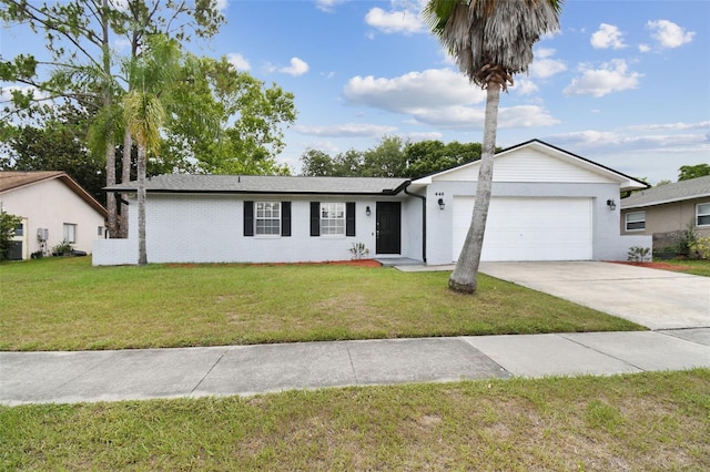 446 Eagle Cir, Casselberry, FL 32707 - ranch-style house with an attached garage, driveway, and a front lawn