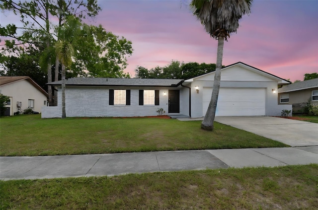 446 Eagle Cir, Casselberry, FL 32707 - single story home featuring an attached garage, driveway, and a lawn