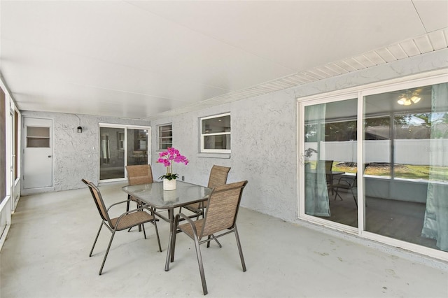 446 Eagle Cir, Casselberry, FL 32707 - sunroom featuring concrete floors and outdoor dining area