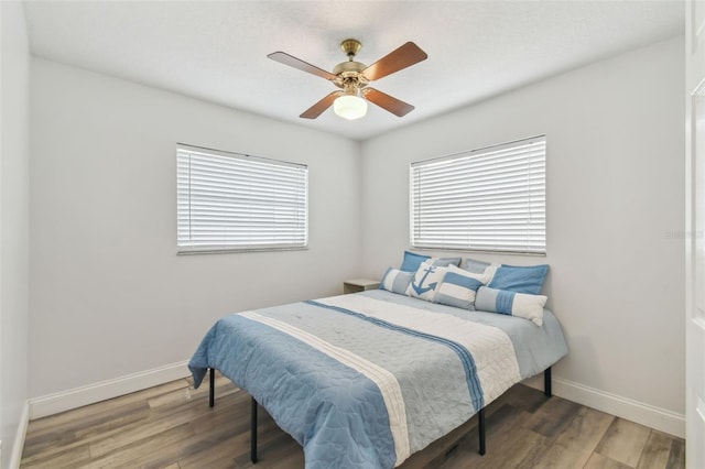 446 Eagle Cir, Casselberry, FL 32707 - bedroom featuring wood finished floors and a ceiling fan