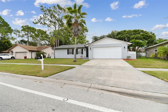 446 Eagle Cir, Casselberry, FL 32707 - ranch-style home featuring an attached garage, stucco siding, and concrete driveway