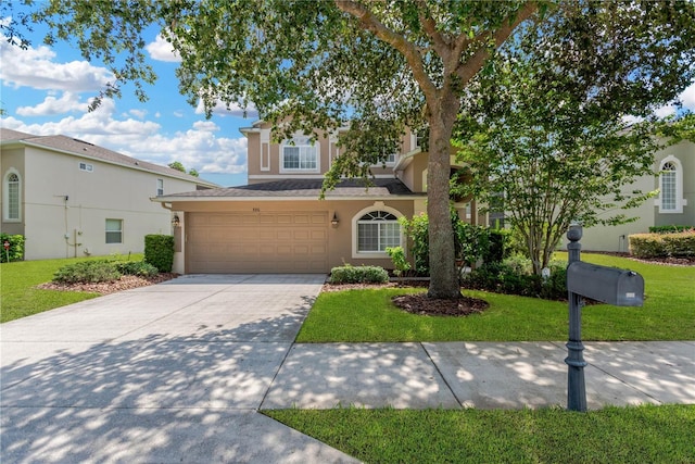 886 Suffolk Pl, Davenport, FL 33896 - view of front facade with stucco siding, concrete driveway, a front yard, and a garage