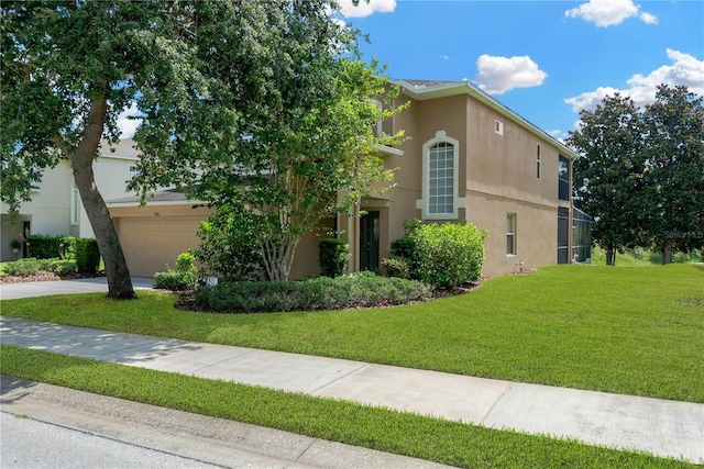 886 Suffolk Pl, Davenport, FL 33896 - view of front of home with stucco siding, a garage, and a front lawn