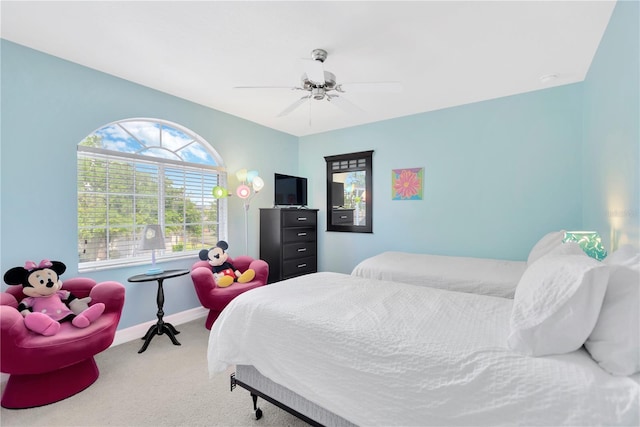 886 Suffolk Pl, Davenport, FL 33896 - carpeted bedroom with baseboards and ceiling fan