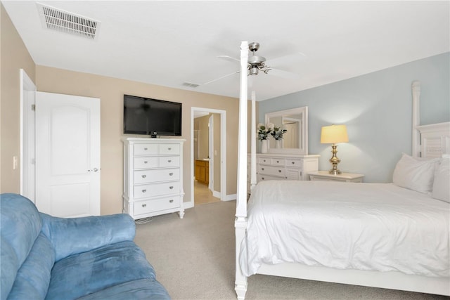 886 Suffolk Pl, Davenport, FL 33896 - bedroom featuring light colored carpet, ceiling fan, and ensuite bath