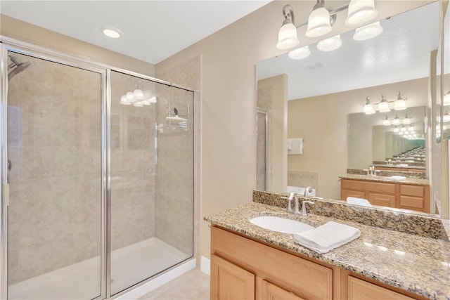 886 Suffolk Pl, Davenport, FL 33896 - full bath with a shower stall, vanity, and tile patterned flooring