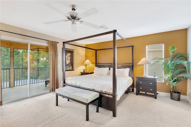 886 Suffolk Pl, Davenport, FL 33896 - carpeted bedroom with access to exterior, multiple windows, and ceiling fan