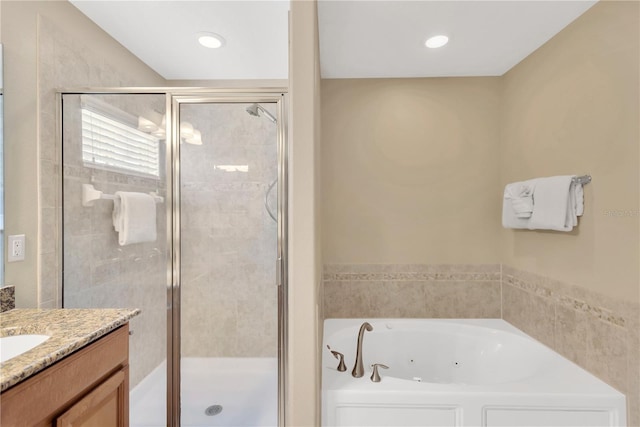 886 Suffolk Pl, Davenport, FL 33896 - full bathroom with a shower stall, a jetted tub, and vanity