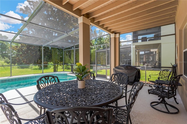 886 Suffolk Pl, Davenport, FL 33896 - sunroom / solarium featuring beamed ceiling and outdoor dining space