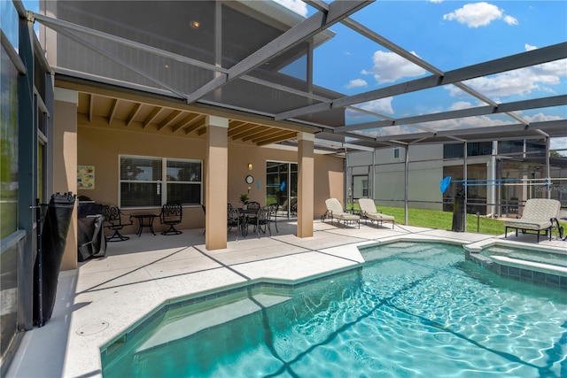 886 Suffolk Pl, Davenport, FL 33896 - view of pool featuring a patio, a pool with connected hot tub, glass enclosure, and outdoor dining area