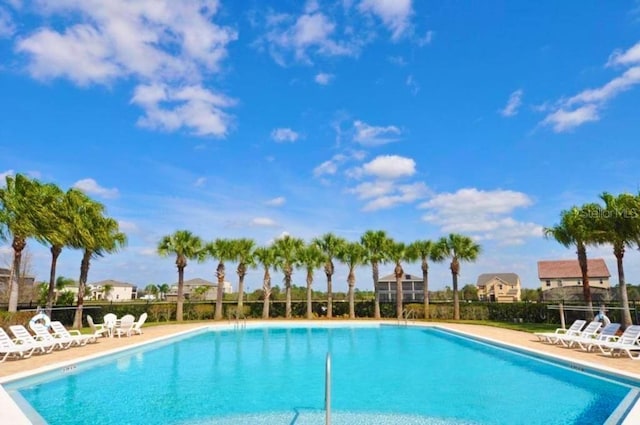 886 Suffolk Pl, Davenport, FL 33896 - community pool featuring a patio area