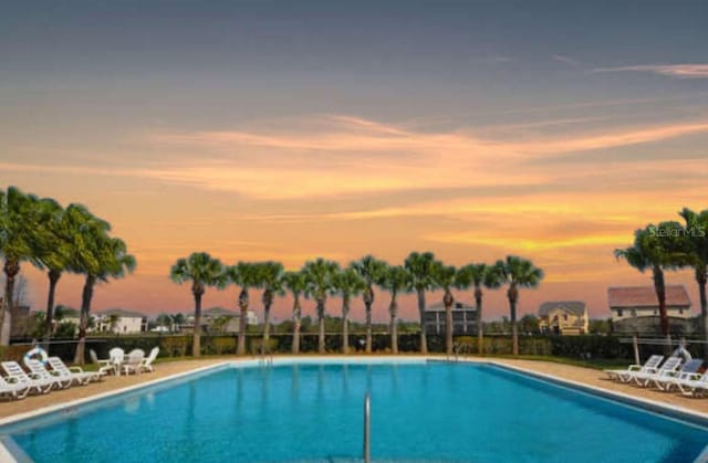 886 Suffolk Pl, Davenport, FL 33896 - pool at dusk with a community pool