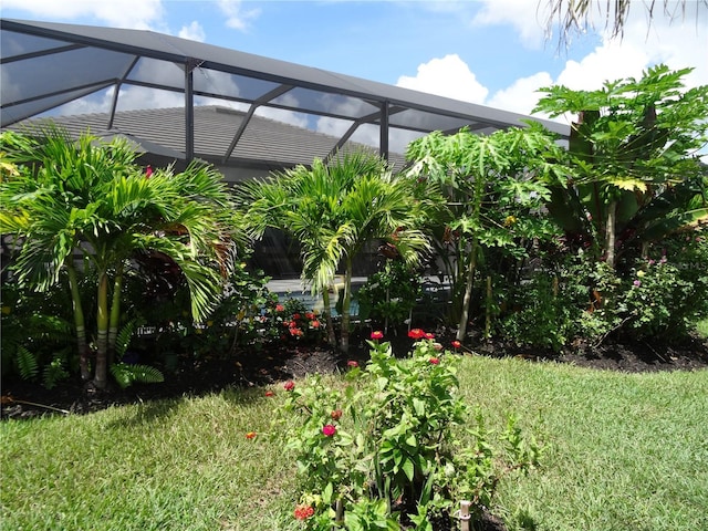 4957 Seafoam Trl, Bradenton, FL 34211 - view of green lawn with a lanai