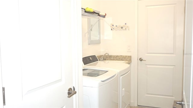 4957 Seafoam Trl, Bradenton, FL 34211 - washroom with washing machine and dryer