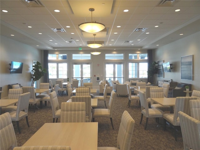 4957 Seafoam Trl, Bradenton, FL 34211 - common area with a paneled ceiling and a towering ceiling