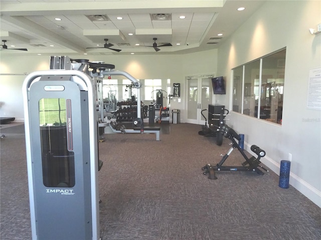 4957 Seafoam Trl, Bradenton, FL 34211 - exercise room with carpet floors, ceiling fan, recessed lighting, and a towering ceiling