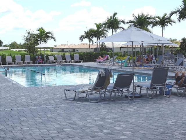 4957 Seafoam Trl, Bradenton, FL 34211 - community pool with a patio