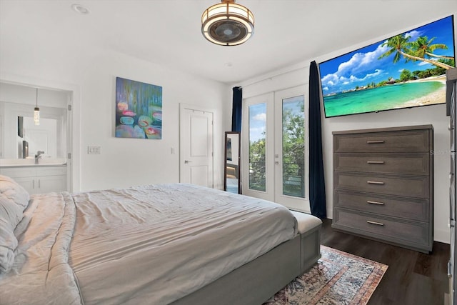 5006 W Idaho St, Tampa, FL 33616 - bedroom with dark wood-style flooring