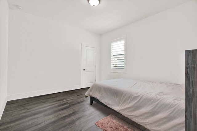 5006 W Idaho St, Tampa, FL 33616 - bedroom with wood finished floors and baseboards