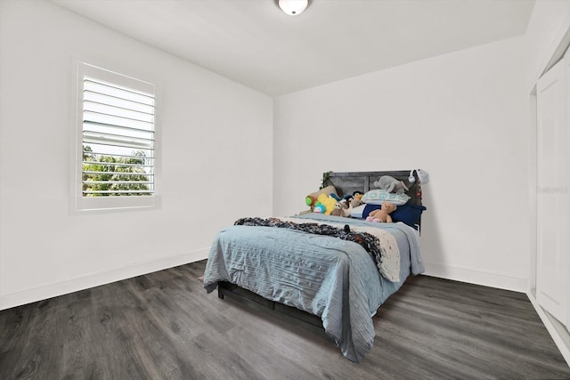 5006 W Idaho St, Tampa, FL 33616 - bedroom with wood finished floors and baseboards