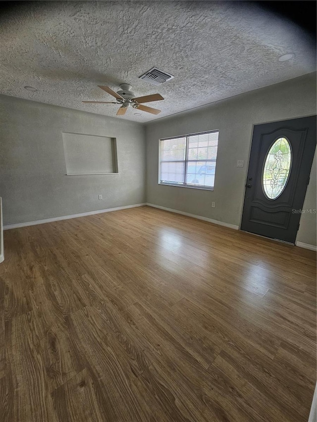 7001 60th St N, Pinellas Park, FL 33781 - foyer featuring wood finished floors and ceiling fan