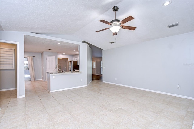 512 Pinewalk Dr, Brandon, FL 33510 - unfurnished living room featuring ceiling fan, vaulted ceiling, recessed lighting, and light tile patterned floors