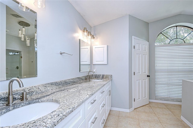 512 Pinewalk Dr, Brandon, FL 33510 - full bath featuring lofted ceiling, double vanity, a shower stall, and tile patterned flooring