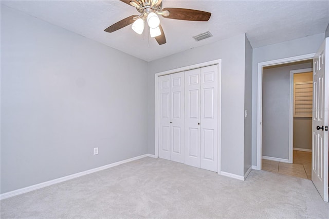 512 Pinewalk Dr, Brandon, FL 33510 - unfurnished bedroom featuring carpet floors, a closet, and ceiling fan