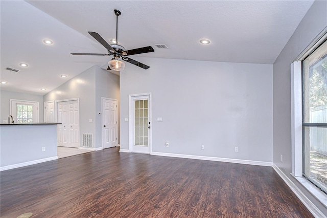 512 Pinewalk Dr, Brandon, FL 33510 - unfurnished living room featuring lofted ceiling, a ceiling fan, wood finished floors, and recessed lighting