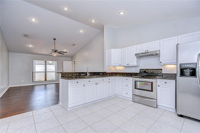 512 Pinewalk Dr, Brandon, FL 33510 - kitchen featuring stainless steel appliances, under cabinet range hood, a peninsula, a ceiling fan, and white cabinets