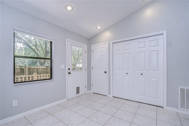 512 Pinewalk Dr, Brandon, FL 33510 - foyer featuring lofted ceiling, light tile patterned flooring, and recessed lighting