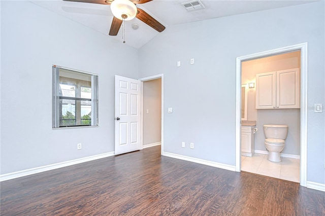512 Pinewalk Dr, Brandon, FL 33510 - unfurnished bedroom with wood finished floors, ensuite bath, beam ceiling, high vaulted ceiling, and a ceiling fan